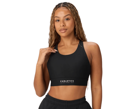 Oasis Twist Sports Bra by Fabletics featuring a stylish twist design for workouts and everyday athleisure wear